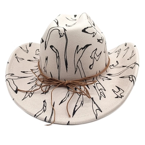 Detail of bird print felt fedora featuring rolled brim and brown bow tie string
