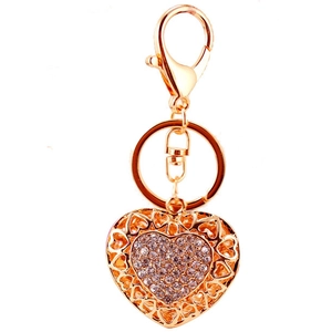 Golden heart-shaped keychain with sparkling crystals and lobster clasp on white background