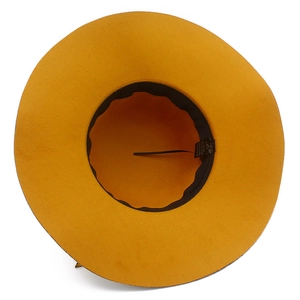 Detail view of ginger wide brim fedora showing inner adjustment string and material label