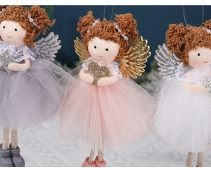 Detail of Christmas angel plush dolls in grey pink and white with mesh skirts and wings