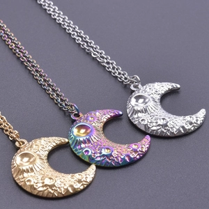 Detailed relief of moon surface textures on colorful crescent pendant necklaces