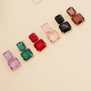 Detail view of colorful macaron square crystal drop earrings in six vibrant colors