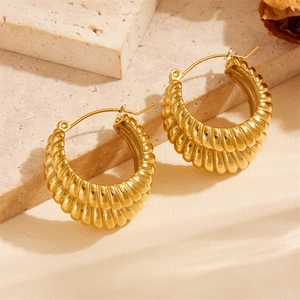 Classic gold plated titanium steel twisted hoop earrings with elegant geometric texture