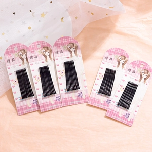 Detailed set of 50 black metal bobby pins on pink JH decorative display cards
