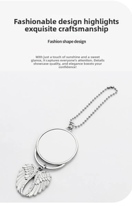Close-up of DIY metal sublimation pendant featuring angel wings and round photo frame