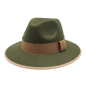 Dark green wool fedora hat with brown band and beige brim piping in British style