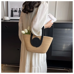 Fashionable beige woven cotton rope tote bag with black contrast handles for women