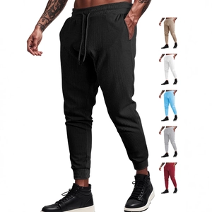 Men's waffle knit jogger pants featuring drawstring waist and multiple color swatches