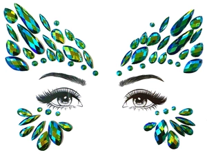 Detail of green and blue iridescent face jewels set for crystal makeup decoration