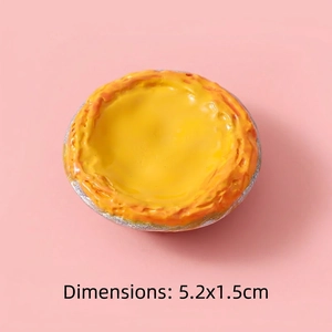 Detailed realistic egg tart resin miniature with dimensions 5.2x1.5cm on pink background