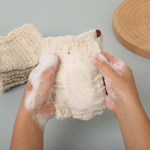 Natural sisal soap foaming bag with drawstring producing rich lather for skin care