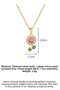 Detail of sunflower pendant with red zircon and green leaves on titanium steel chain