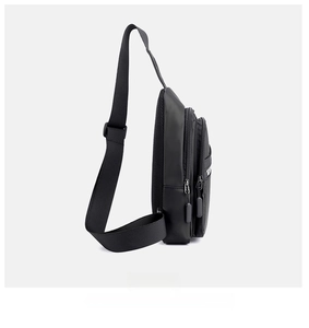 Side view of black crossbody chest bag featuring multi-layer zippers and breathable mesh
