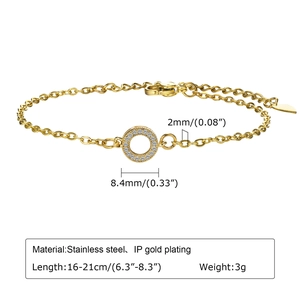 Detail view of 18K gold plated stainless steel bracelet with white zircon circle charm