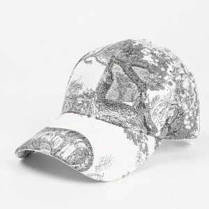 Detail view of cotton baseball cap with black Toile de Jouy landscape pattern print