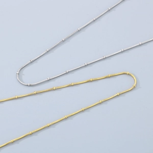 Adjustable stainless steel snake chain necklaces in gold and silver with ball accents