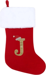 Detail of red Christmas stocking with plush cuff and gold glitter letter J decoration