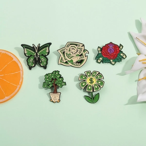 5-piece set of enamel money pins featuring dollar butterfly, rose, and money tree designs