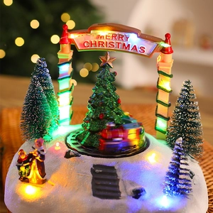 Détail de boîte à musique de Noël avec LED, train rotatif et arche Joyeux Noël