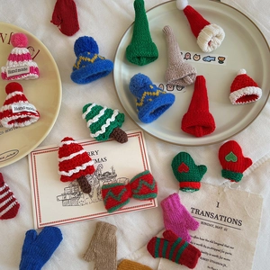 Mini hand-knitted Christmas tree ornaments set including tiny hats and gloves