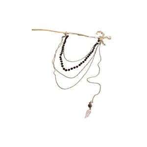 Épingle à cheveux argentée avec de longs glands noirs et pendentif feuille vintage