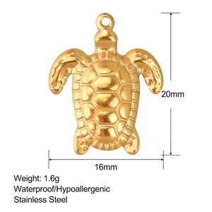 Detailed view of a golden stainless steel turtle pendant with precise dimensions and weight