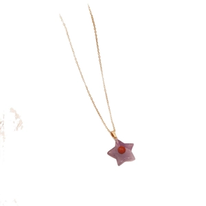Star-shaped purple natural stone pendant with red center on golden stainless steel chain