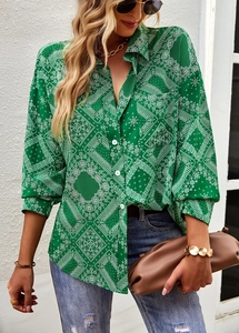Detail shot of green paisley print long sleeve shirt with classic button-up design