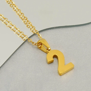 Minimalist gold stainless steel necklace featuring a polished number 2 pendant on an O-chain