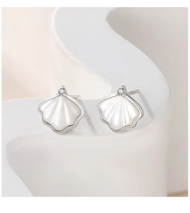Macro shot of S925 sterling silver ginkgo leaf earrings with white mother of pearl inlay