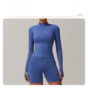 Close-up of slim-fit yoga jacket showing front zipper and thumbhole cuffs detail