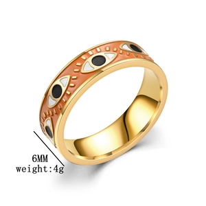 Detail of 6mm gold evil eye ring showing width and 4g weight specifications