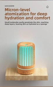 Detail of wood grain aromatherapy diffuser showing blue light and timer controls on stand