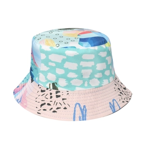Double-sided sun hat featuring abstract dragon stripe pattern for outdoor sun protection