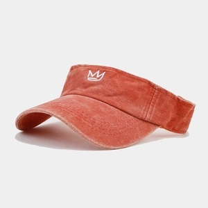 Detail view of washed cotton sun visor with vintage crown embroidery and adjustable strap