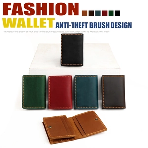 Detail of vintage crazy horse leather card holders showing RFID protection and color options