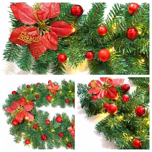2.7m luxury Christmas garland with red flowers, gold ornaments, and warm LED lights