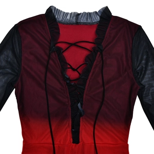 Detail of red and black gradient mesh dress featuring a V-neckline with ruffled tie-up accents