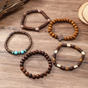 Detailed view of 5-piece multilayer wooden and coconut shell beaded cross bracelets set