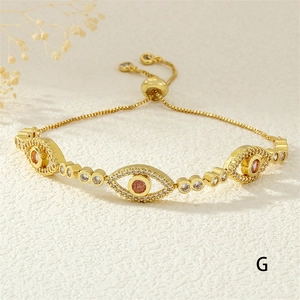 Detail of adjustable slider clasp on 18K gold plated pink evil eye bracelet