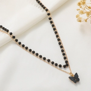 Gothic double-layered butterfly pendant necklace with black beads and gold-tone chain