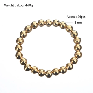Vista dettagliata del bracciale elastico con perline dorate da 8mm, 26 pezzi, peso di 44,8g
