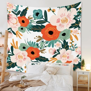 Detail of bohemian wall tapestry with vintage floral patterns in a cozy bedroom setting