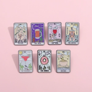 Set of seven vintage tarot style enamel pins featuring creative food and drink illustrations