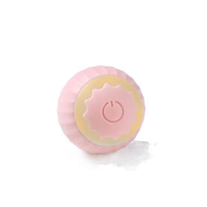 Smart interactive pink rolling ball cat toy with silicone texture and power button