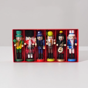 Set of 6 colorful wooden nutcracker king figures in a festive red presentation gift box