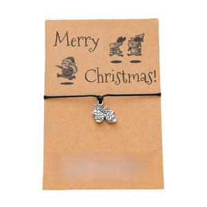 Handmade Christmas wish bracelet with glove pendant on card, black woven rope for gifting