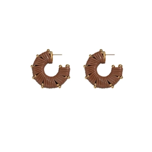 Bohemian C-shaped hoop earrings with brown woven texture and gold metallic beads