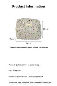 Detailed view of quilted cotton floral cosmetic bag showing 26x18x7cm dimensions