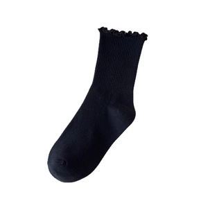 Women's black cotton socks with knit texture and stylish frilly ruffle cuff design